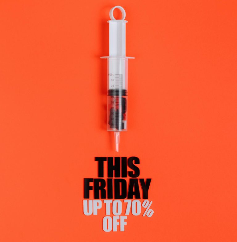 Creative syringe sale promotion offering up to 70% off this Friday.